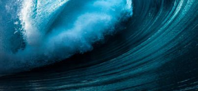 Close-up of curling blue ocean wave