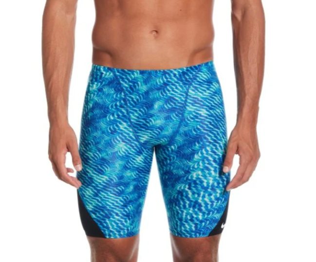 Man wearing blue patterned swim jammers