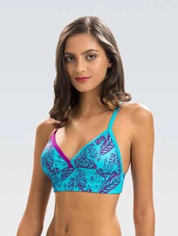 Woman wearing turquoise printed bralette top