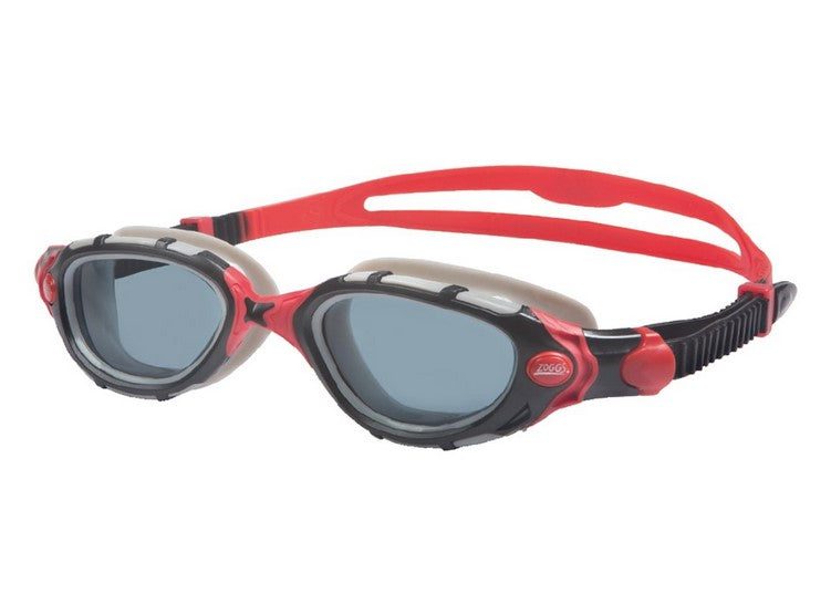 Red strap swimming goggles with tinted lenses