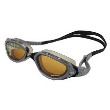 Pair of tinted swimming goggles with black strap