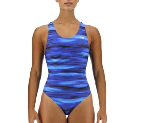Model wearing blue wavy one-piece swimsuit