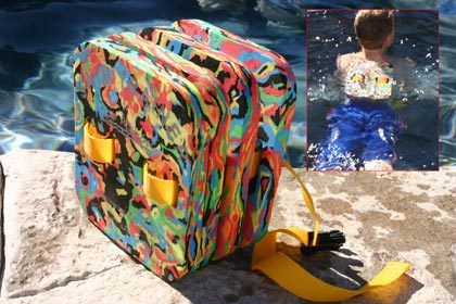 Colorful flotation backpack on pool deck