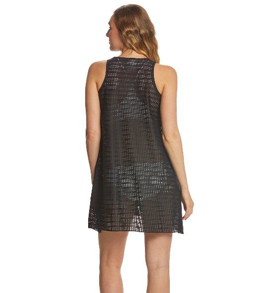 Woman wearing black mesh sleeveless beach cover-up