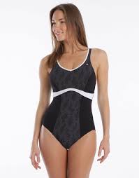 Woman in black one-piece swimsuit with white trim