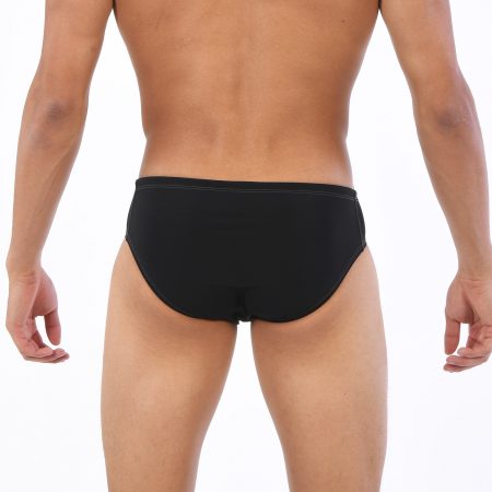 Rear view of person wearing black briefs