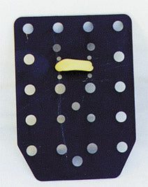 Black perforated panel with yellow clip