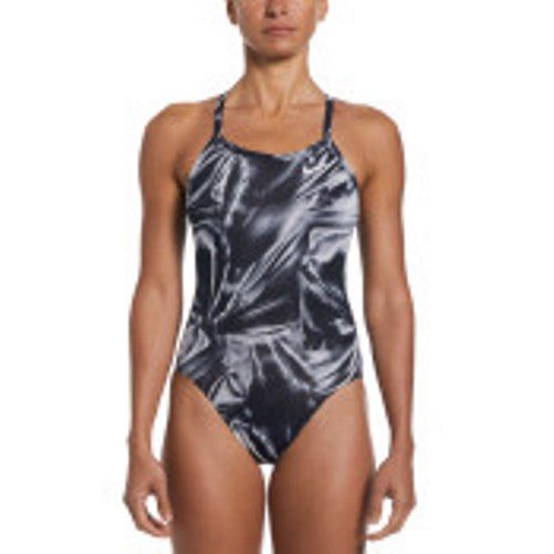 Woman modeling black patterned one-piece swimsuit