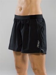 Person wearing black athletic running skirt