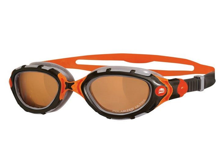 Orange and black swim goggles with tinted lenses