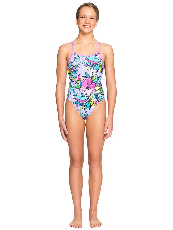 Smiling model in floral one-piece swimsuit