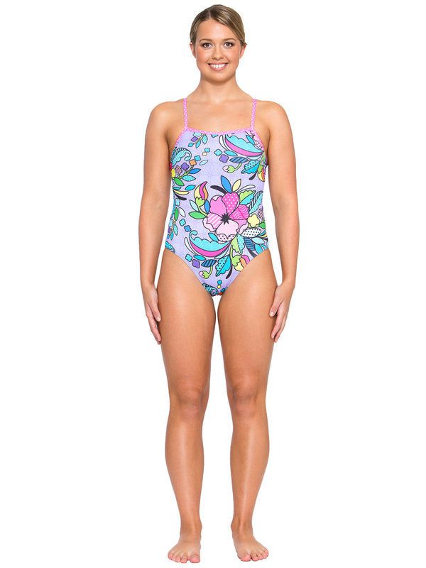 Woman in colorful floral one-piece swimsuit